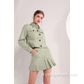Oliwkowo-zielona kurtka damska i plisowana mini spódniczka